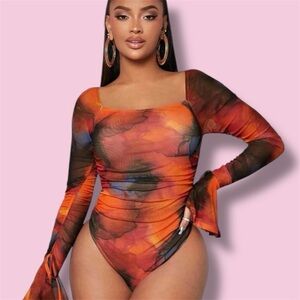 SOLD!!! Stylish Orange and Black Long Sleeve Bodysuit